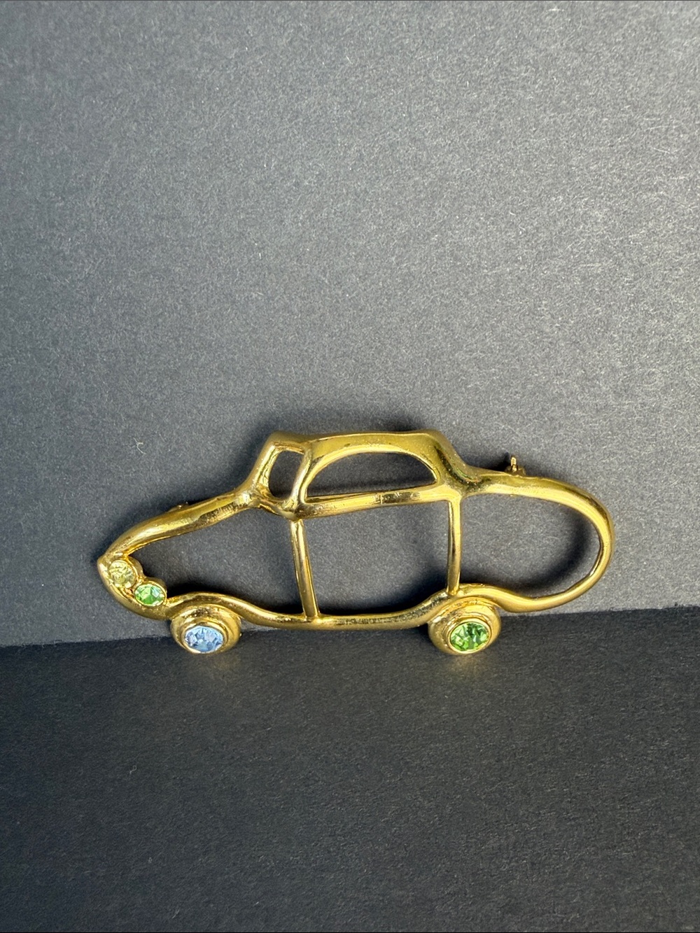 Gold-Tone Car Outline Brooch with Blue and Green Stones